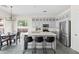 Modern kitchen features gray cabinets, a large center island, and stainless steel appliances at 1528 E Harrison St, Gilbert, AZ 85295