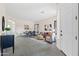 Spacious open-concept living and dining area featuring stylish decor and abundant natural light at 1528 E Harrison St, Gilbert, AZ 85295