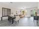 Open-concept living and dining area with stylish decor, featuring natural light and comfortable seating at 1528 E Harrison St, Gilbert, AZ 85295