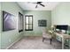 Inviting office with a neutral palette, complemented by a comfortable chair and ample natural light at 1528 E Harrison St, Gilbert, AZ 85295