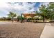 Gathering-friendly neighborhood playground with shade structures, play equipment, and a walking path for active living at 1528 E Harrison St, Gilbert, AZ 85295