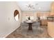 Cozy dining room features a round table and chairs, perfect for Gathering meals and casual gatherings at 16508 N 114Th Dr, Surprise, AZ 85378