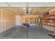 Spacious two car garage with ample storage and concrete floor at 16508 N 114Th Dr, Surprise, AZ 85378