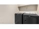 Contemporary laundry room with modern Maytag washer and dryer at 16508 N 114Th Dr, Surprise, AZ 85378