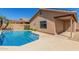 Private backyard oasis with sparkling pool and covered patio at 16508 N 114Th Dr, Surprise, AZ 85378