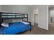Bedroom with a bunk bed and open closet area featuring wood-look flooring at 19372 E Timberline Rd, Queen Creek, AZ 85142