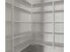 Walk-in pantry shelving provides ample storage for any homeowner at 19372 E Timberline Rd, Queen Creek, AZ 85142