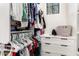 Closet featuring well-organized clothes, shelves, drawers, and window at 20690 E Sunset Dr, Queen Creek, AZ 85142