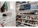 Well-organized closet featuring shelves and drawers for optimal storage at 20690 E Sunset Dr, Queen Creek, AZ 85142