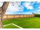 Spacious backyard with lush greenery and beautiful mountain views, offering a serene and private outdoor space at 20690 E Sunset Dr, Queen Creek, AZ 85142