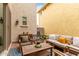 Outdoor patio area with comfortable seating and attractive decor at 2571 S Melvin St, Gilbert, AZ 85295