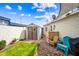 Backyard with shed, a sitting area with pavers, blue chair and enclosed space perfect for storage or relaxation at 3126 N 17Th Dr, Phoenix, AZ 85015