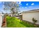 Inviting backyard featuring green lawn, patio, swimming pool, mature trees and ample space for outdoor enjoyment at 3126 N 17Th Dr, Phoenix, AZ 85015