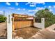 Gated front entrance with parking and decorative pergola at 3126 N 17Th Dr, Phoenix, AZ 85015
