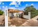 Charming property with pergola-covered parking area and landscaped yard at 3126 N 17Th Dr, Phoenix, AZ 85015