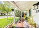 Inviting front porch with stylish decor, comfortable seating, and lush greenery at 3126 N 17Th Dr, Phoenix, AZ 85015
