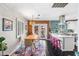 Eat-in kitchen with dining area, statement brick wall, and a view of the backyard at 3126 N 17Th Dr, Phoenix, AZ 85015
