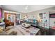 Spacious living room with hardwood floors, contemporary furniture, and an open layout at 3126 N 17Th Dr, Phoenix, AZ 85015