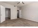 Spacious bedroom with carpeted floors and doorways to the bathroom and closet at 3302 N 7Th St # 108, Phoenix, AZ 85014