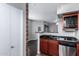 Efficient kitchen with stainless appliances and granite counters, seamlessly connecting to living space at 3302 N 7Th St # 108, Phoenix, AZ 85014