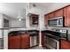 Modern kitchen with stainless steel appliances and granite countertops, perfect for culinary enthusiasts at 3302 N 7Th St # 108, Phoenix, AZ 85014