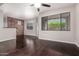 Bright, open living room features hardwood floors and large windows, creating an inviting atmosphere at 3302 N 7Th St # 108, Phoenix, AZ 85014