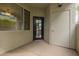 Covered patio featuring a door to the outside and extra storage at 3302 N 7Th St # 108, Phoenix, AZ 85014