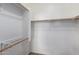 Walk-in closet includes shelving and bars for hanging clothes at 3302 N 7Th St # 108, Phoenix, AZ 85014