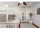 Bedroom featuring bunkbeds, wood floors, and french doors at 3514 N 83Rd St, Scottsdale, AZ 85251