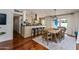 Kitchen and dining area with access to the outdoor pool and patio at 3514 N 83Rd St, Scottsdale, AZ 85251
