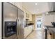 Kitchen featuring stainless steel refrigerator and custom cabinets at 3514 N 83Rd St, Scottsdale, AZ 85251