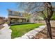 Expansive backyard with a lush lawn and concrete walkway, ideal for outdoor activities and gatherings at 4330 W Aracely Dr, New River, AZ 85087