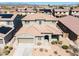 Attractive home with desert landscaping, a tile roof, and a convenient two-car garage at 4330 W Aracely Dr, New River, AZ 85087