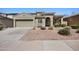 Charming single-Gathering home with a desert landscape, a two-car garage, and a tile roof at 4330 W Aracely Dr, New River, AZ 85087