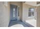 Inviting front door with decorative glass and sidelight, creating a welcoming entrance to the home at 4330 W Aracely Dr, New River, AZ 85087