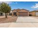 Charming single-story home with desert landscaping and two-car garage at 44865 W Miraflores St, Maricopa, AZ 85139