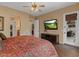Bright bedroom features an en-suite bathroom and backyard access at 4515 E Rakestraw Ln, Gilbert, AZ 85298