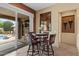 Breakfast nook with pool view and elegant decor at 4515 E Rakestraw Ln, Gilbert, AZ 85298