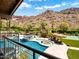 Luxury backyard pool and spa with desert mountain views, an outdoor bar, and plenty of space for entertaining at 5040 N Arcadia Dr, Phoenix, AZ 85018