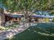Lush backyard with manicured lawn and water feature, creating a serene outdoor space for relaxation at 5040 N Arcadia Dr, Phoenix, AZ 85018
