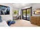 Bright office and bedroom featuring a large glass door and a pool view at 5040 N Arcadia Dr, Phoenix, AZ 85018