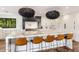 Stylish kitchen with a large center island, modern lighting fixtures, and stainless steel appliances at 5040 N Arcadia Dr, Phoenix, AZ 85018