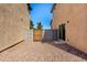 Home's side yard features a block wall and rock ground cover at 5233 W Albeniz Pl, Phoenix, AZ 85043