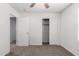 Bedroom featuring a closet, neutral walls, and carpeted floors at 5233 W Albeniz Pl, Phoenix, AZ 85043