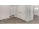 Spacious bedroom with neutral carpeting and ample closet space at 5233 W Albeniz Pl, Phoenix, AZ 85043