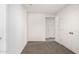 Cozy bedroom with neutral carpeting, fresh white walls, and closet at 5233 W Albeniz Pl, Phoenix, AZ 85043