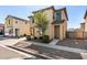 Two-story home with desert landscaping and a sidewalk leading to the front door at 5233 W Albeniz Pl, Phoenix, AZ 85043