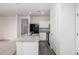 Well-designed kitchen featuring stone countertops with modern cabinets and appliances at 5233 W Albeniz Pl, Phoenix, AZ 85043