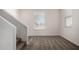 Upstairs landing with carpet and neutral walls at 5233 W Albeniz Pl, Phoenix, AZ 85043