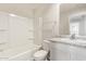 Bathroom with a shower and tub combo, sink and a toilet at 5472 W Fulton St, Phoenix, AZ 85043